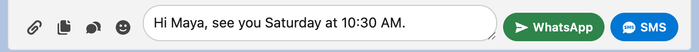 The feed composer with a typed message, the attach, template, chat-script and emoji buttons on the left, and the green WhatsApp and blue SMS send buttons on the right