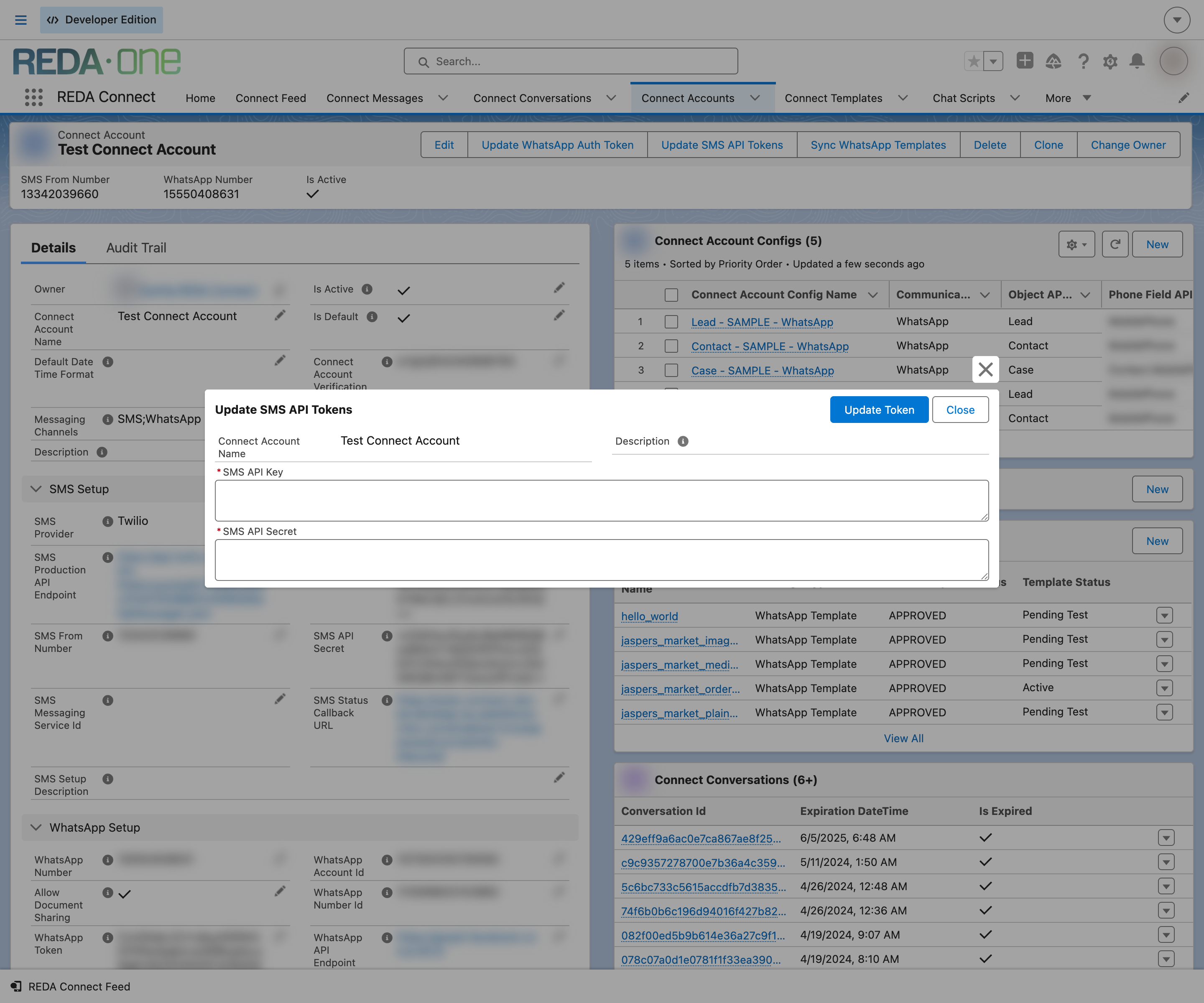 The Update SMS API Tokens quick action open over a Connect Account record, showing the read-only Connect Account Name and empty required SMS API Key and SMS API Secret entry fields with Update Token and Close buttons - the way credentials are replaced without ever displaying the current values.