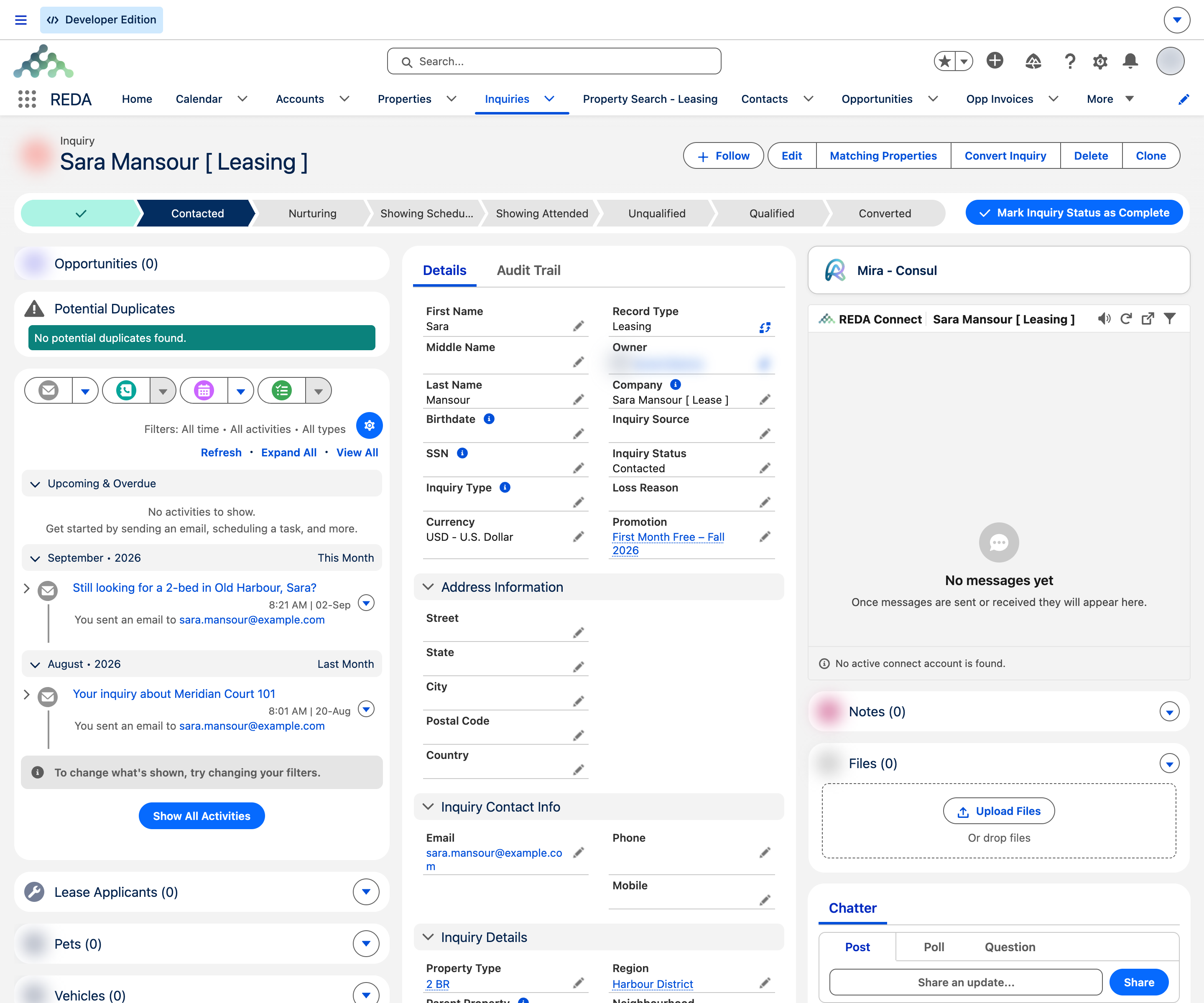 An Inquiry record's Activity timeline showing two emails automatically synced onto the record, each with its subject, the recipient address and the date sent, grouped by month alongside the inquiry's status path and contact details.